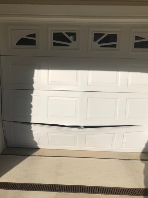 How to keep from backing into garage door.
